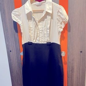 Calvin Klein Black and Cream pencil skirt dress. Short sleeve with button up.